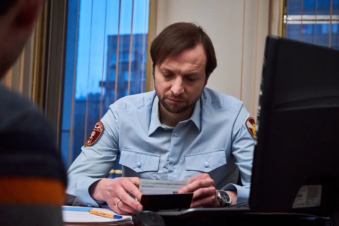 Person reviewing court documents with a worried expression