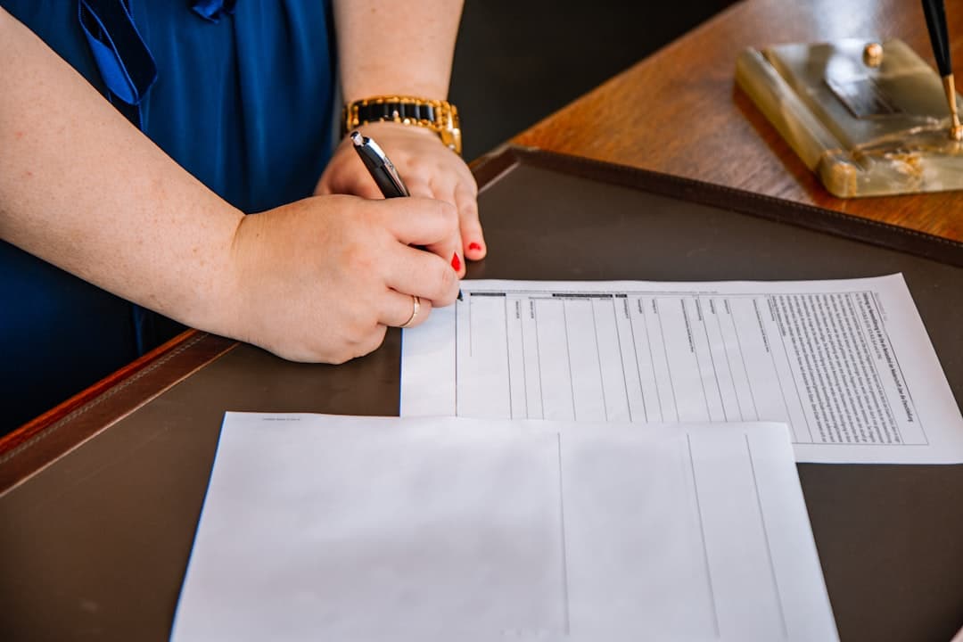 person reviewing a legal case file and court documents