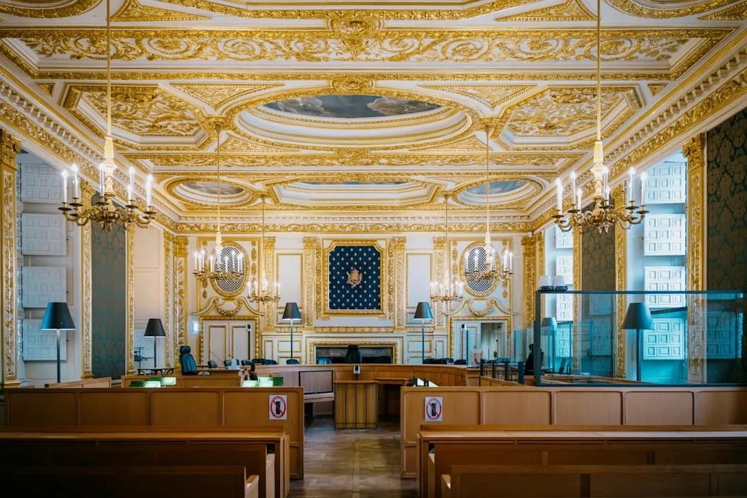interior of a professional courtroom with judge bench and counsel tables