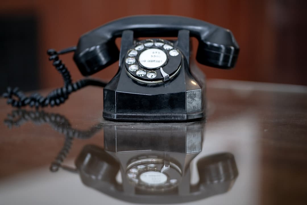 A phone ringing repeatedly from a persistent debt collector