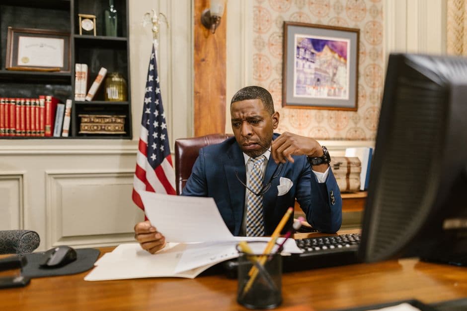 Person reviewing court documents and legal summons