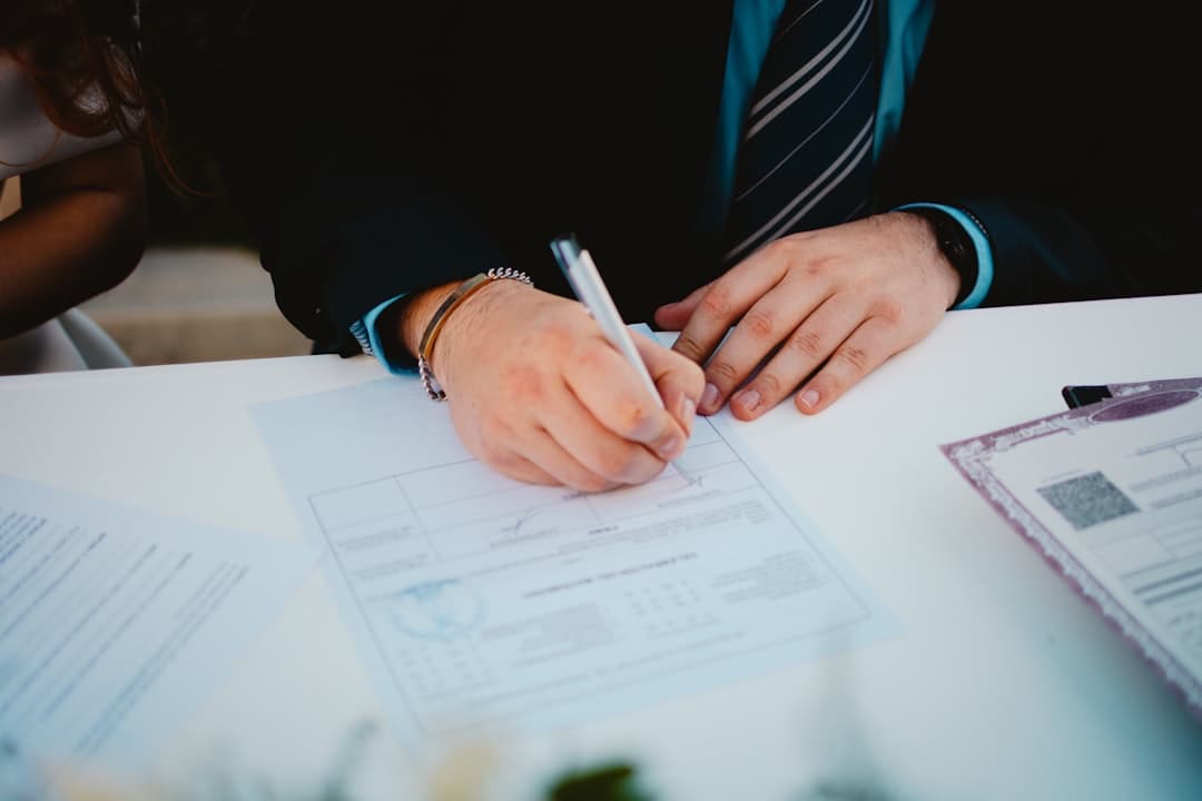 Person filling out a legal form for a debt lawsuit answer