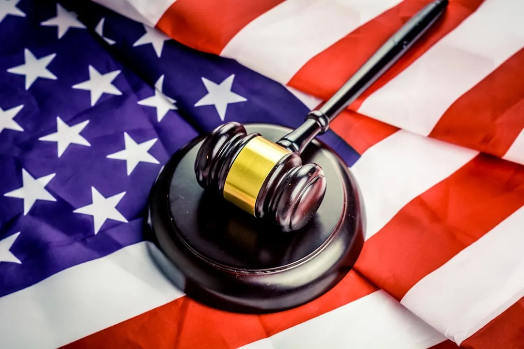 A judge's gavel resting on a desk symbolizing a final court order and default judgment
